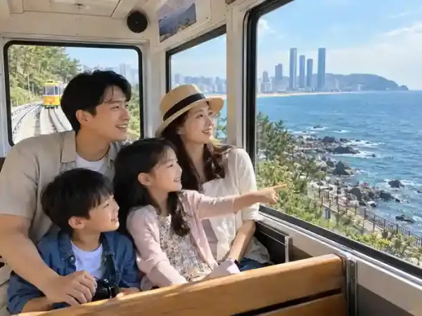 Keluarga naik Kereta Pantai Haeundae di Busan untuk wisata Busan keluarga